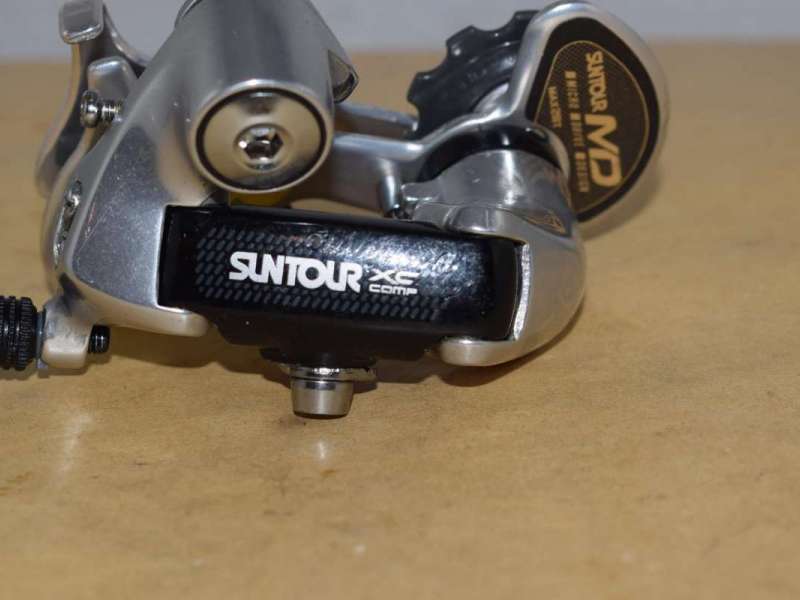 Suntour XC COMP rear derailleur short cage silver / black NOS